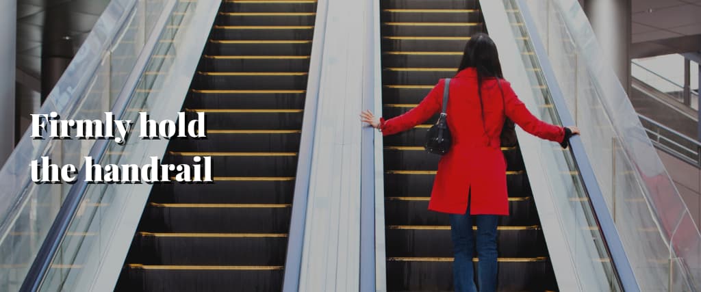 Firmly hold the handrail