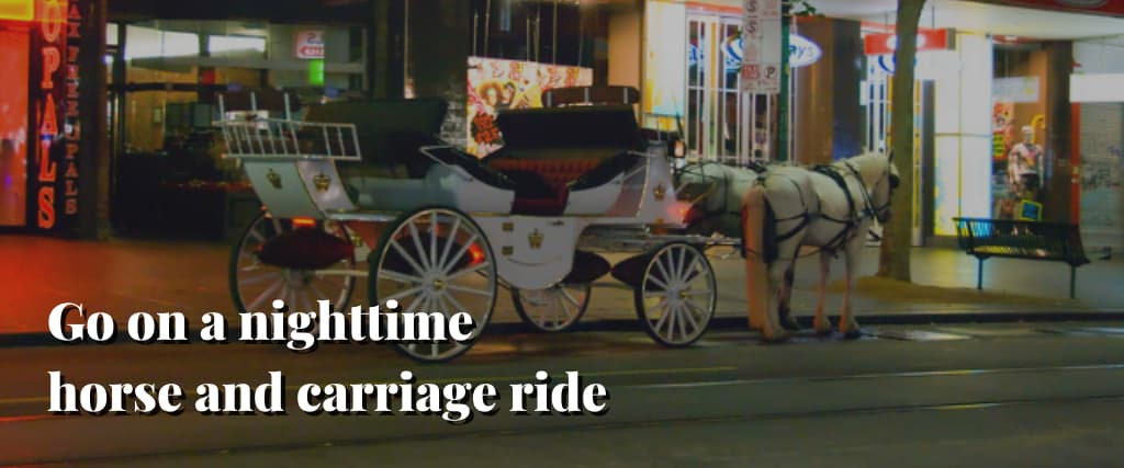 Go on a nighttime horse and carriage ride